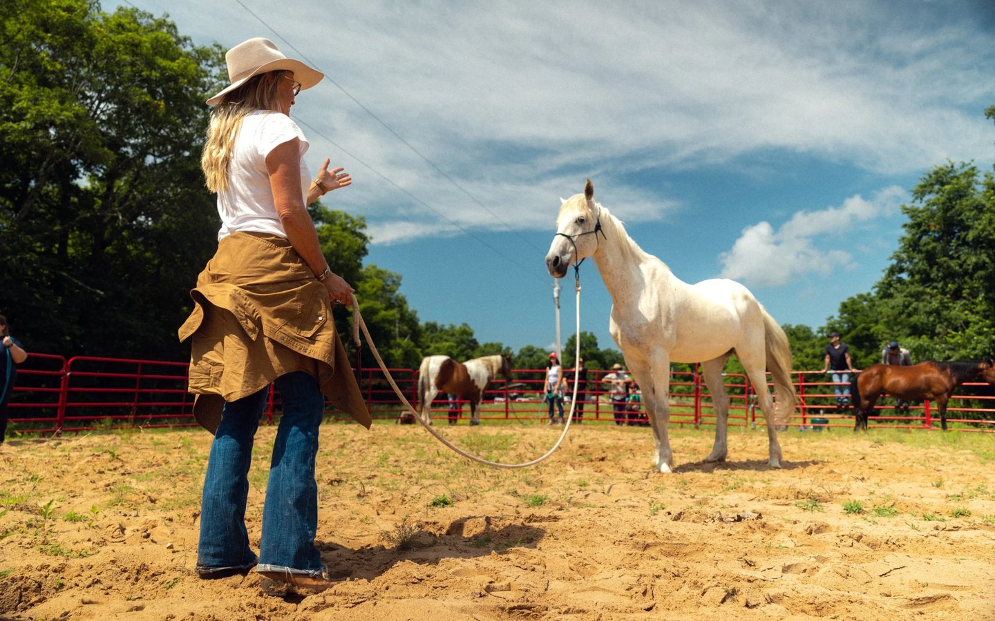 Holly of Circle Yoga Shala working with a horse